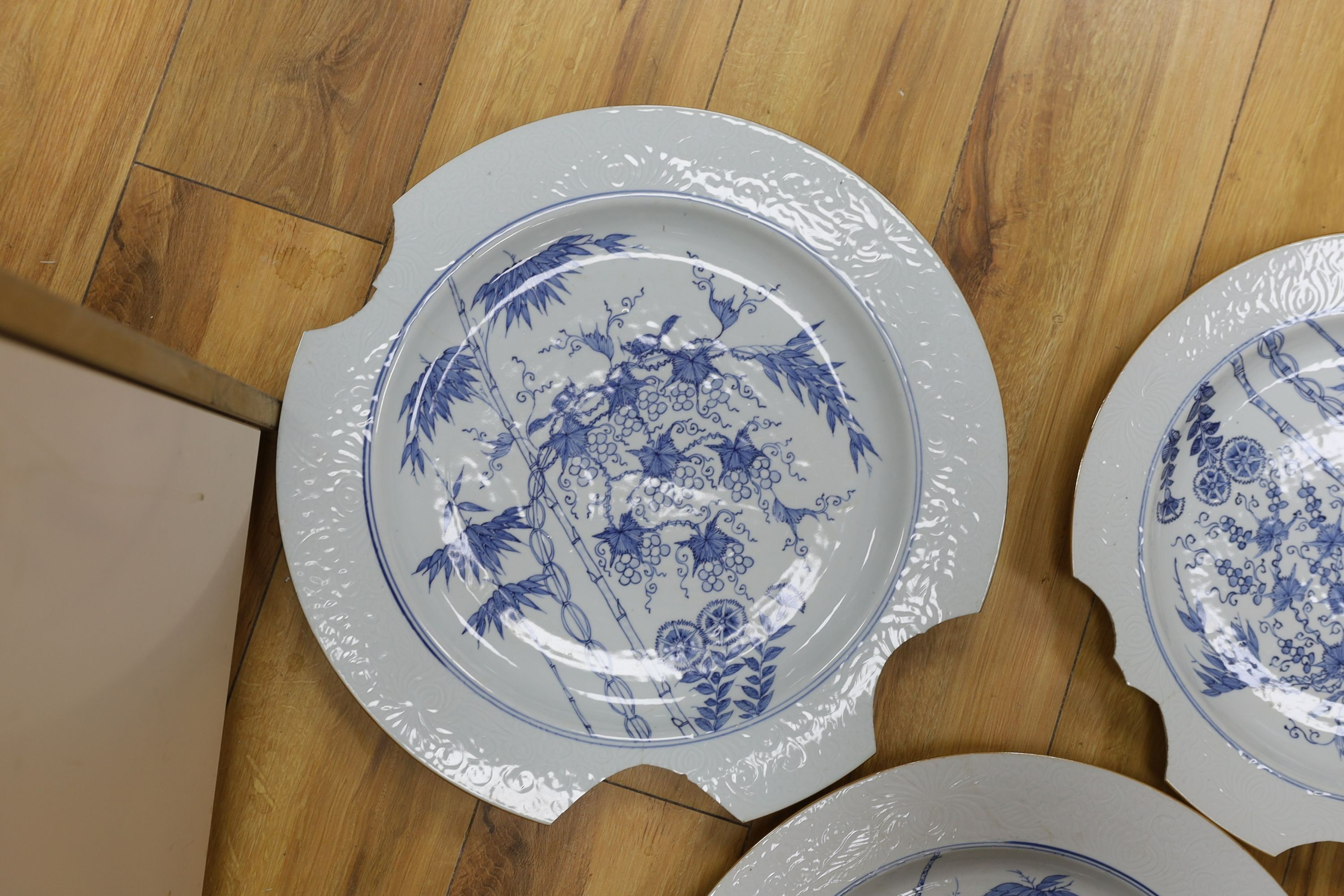A group of three 18th century Chinese blue and white ‘squirrel, bamboo and vine’ chargers (a.f) 42cm